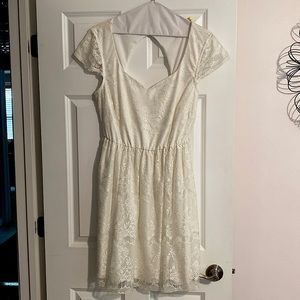 WORN ONCE FOR GRADUATION. Dry cleaned. Off-white lace dress.